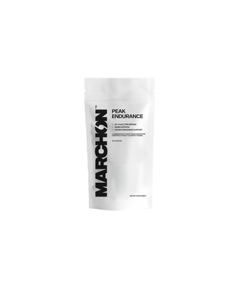 A white packet of Marchon Peak Endurance supplement with black and red text.
